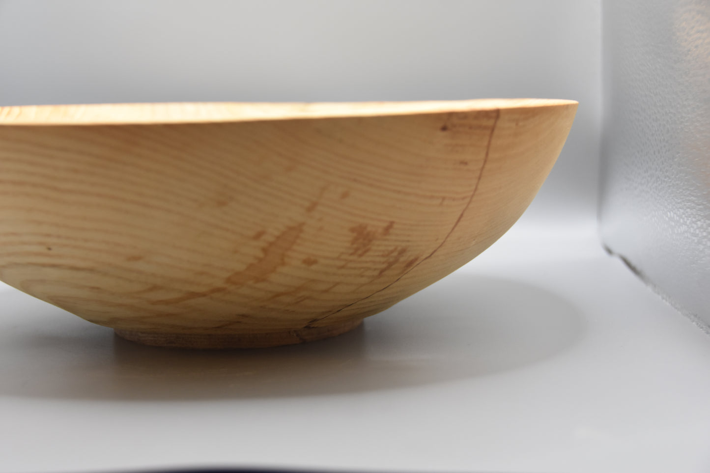 Ligh colored and spalted ash bowl with angled rim