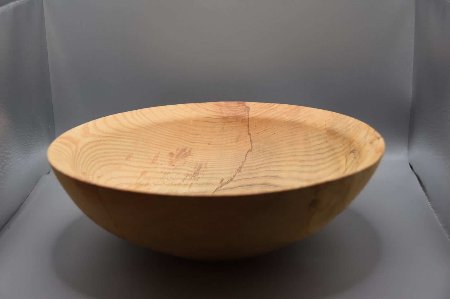 Ligh colored and spalted ash bowl with angled rim