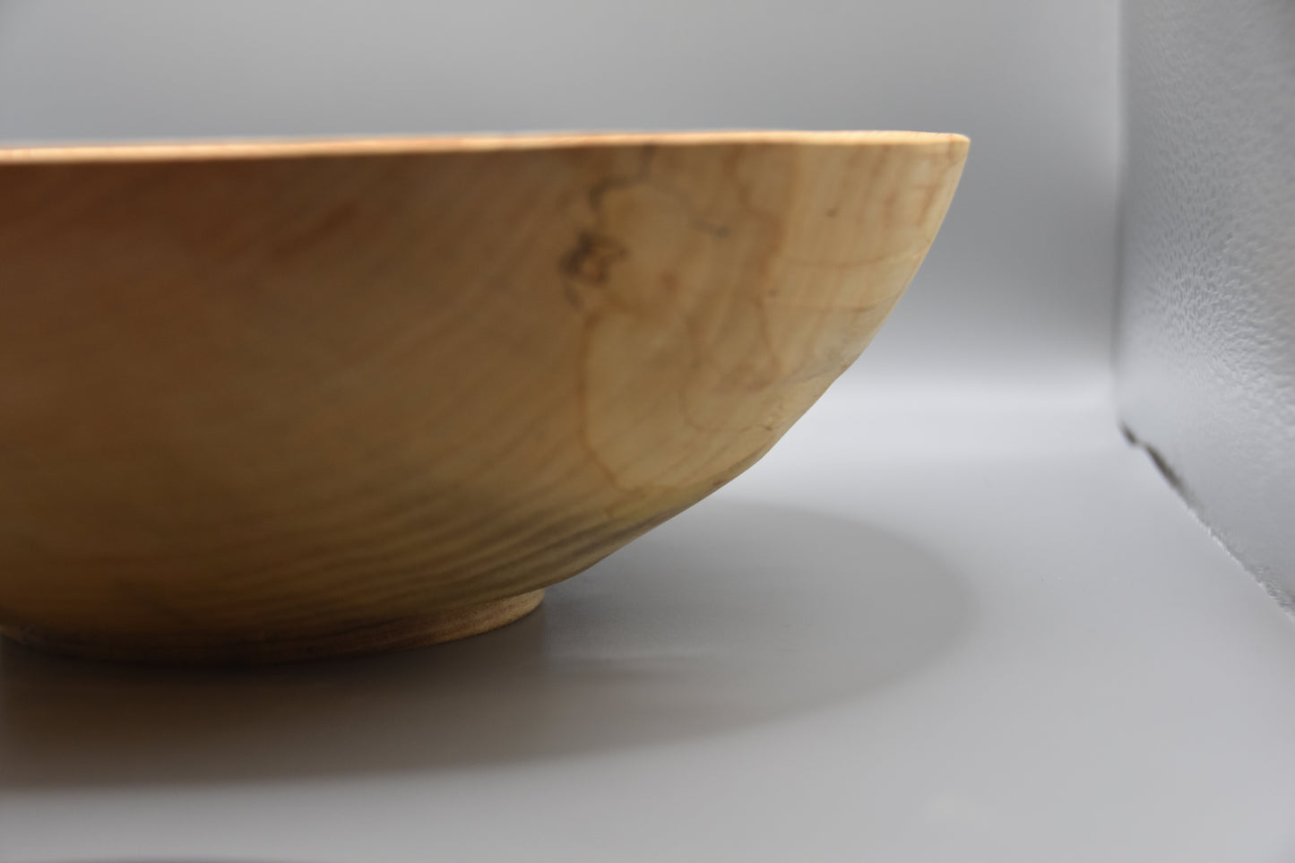 Ligh colored and spalted ash bowl with angled rim